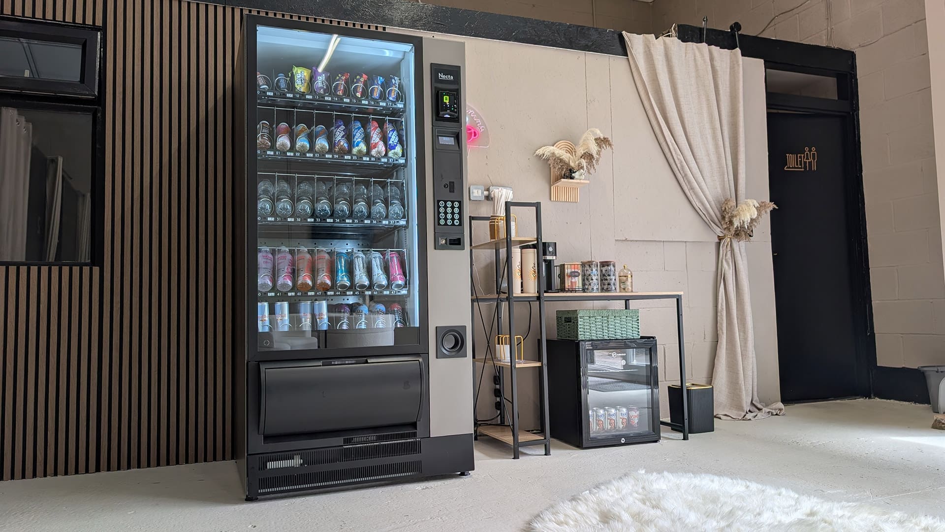 A fully managed Graab sports nutrition vending machine installed in a premium gym facility.